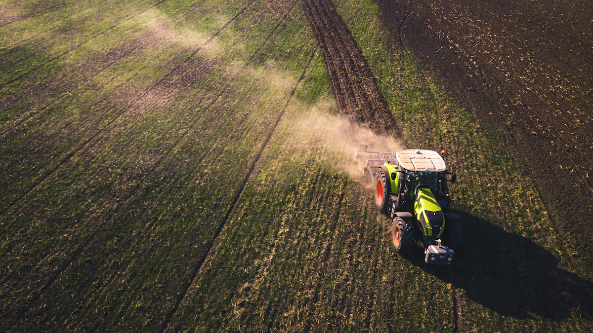 Tractor working across an agricultural field