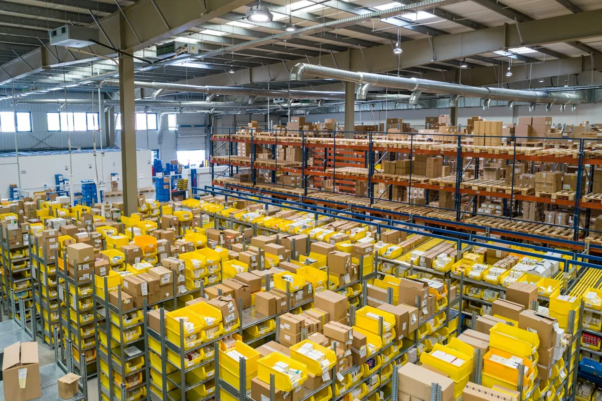 Warehouse shelves and organized inventory across a fulfillment facility