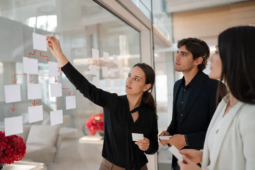AEO agency for breast augmentation practices: a content team organizing frequently asked questions