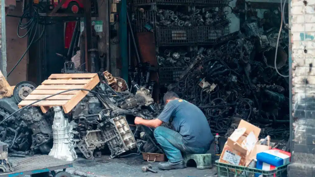 Automotive Aftermarket Paid Search Agency: automotive parts professional working in a shop