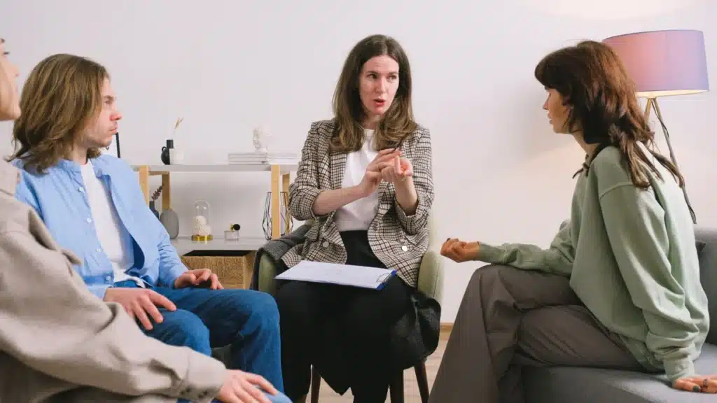 Behavioral Health and Addiction Treatment SEO Agency: therapist guiding a group counseling discussion