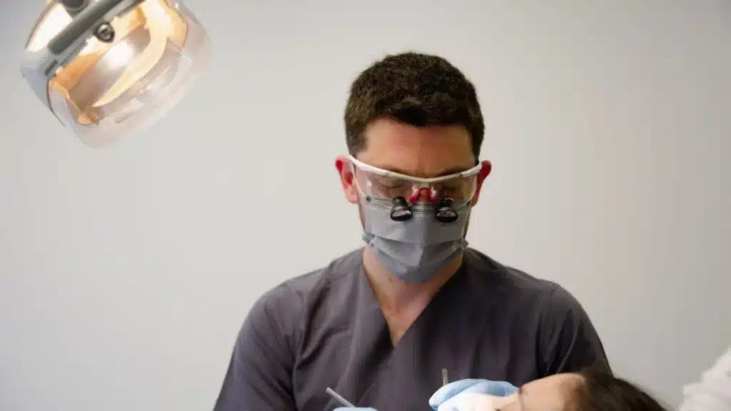 Cosmetic Dentistry SEO Agency Photo B SEO Services for Cosmetic Dentistry: dentist working with a patient in a clinic