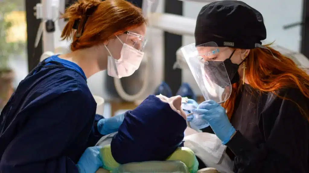 DSO Lead Generation Agency Photo B DSO Appointment Conversion Agency: dental professionals examining a patient