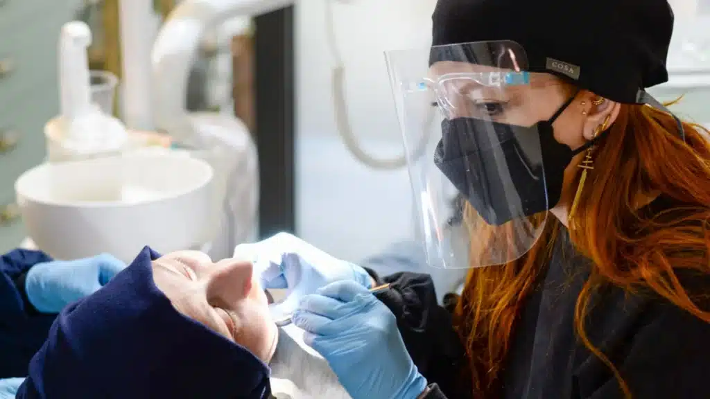 DSO GEO Agency: dentist conducting a detailed oral examination