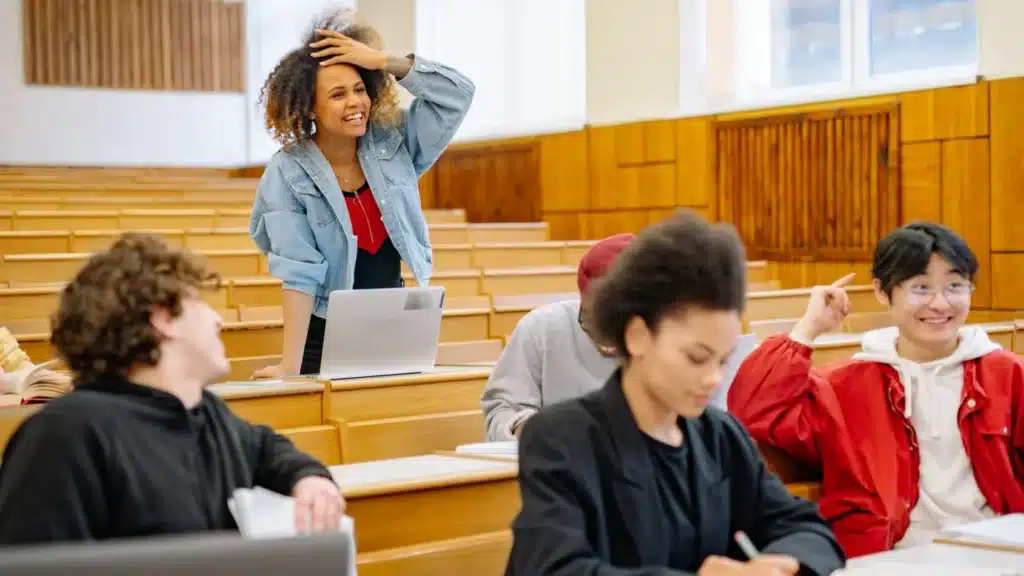 Professional Certification AEO Agency: college students collaborating in a lecture hall