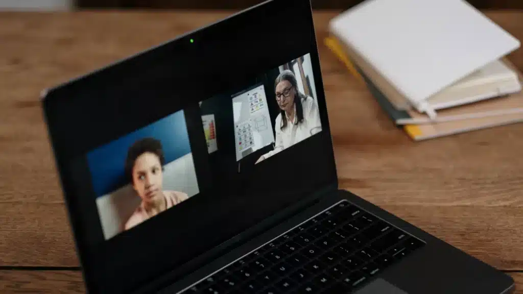 Online Education Marketing Company: instructor teaching an online class through a laptop