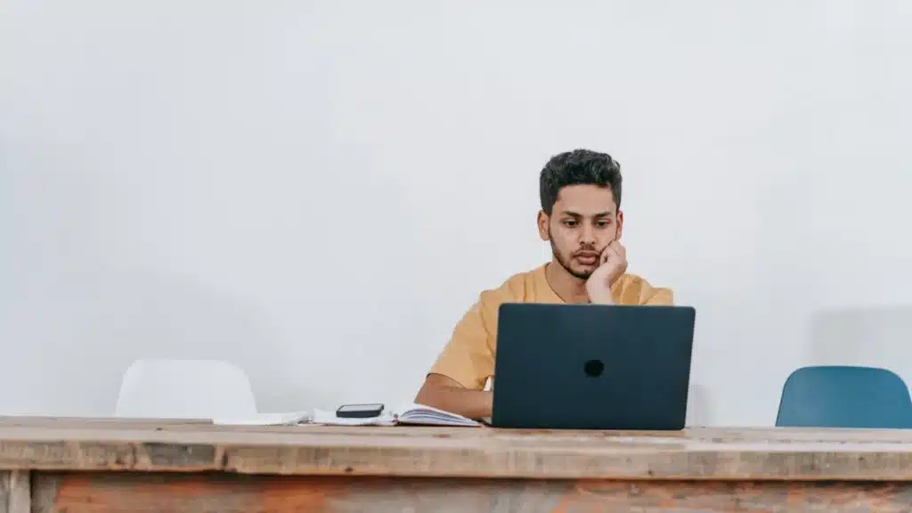 Higher Education Paid Search Agency: adult learner studying through an online course