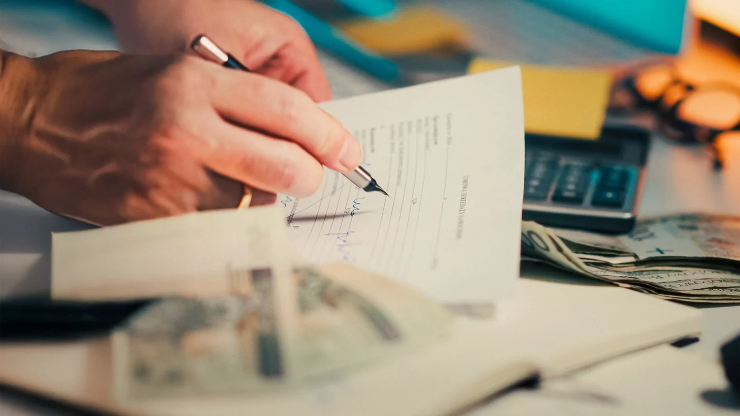 Mortgage SEO Agency: business desk with financial documents and contract materials