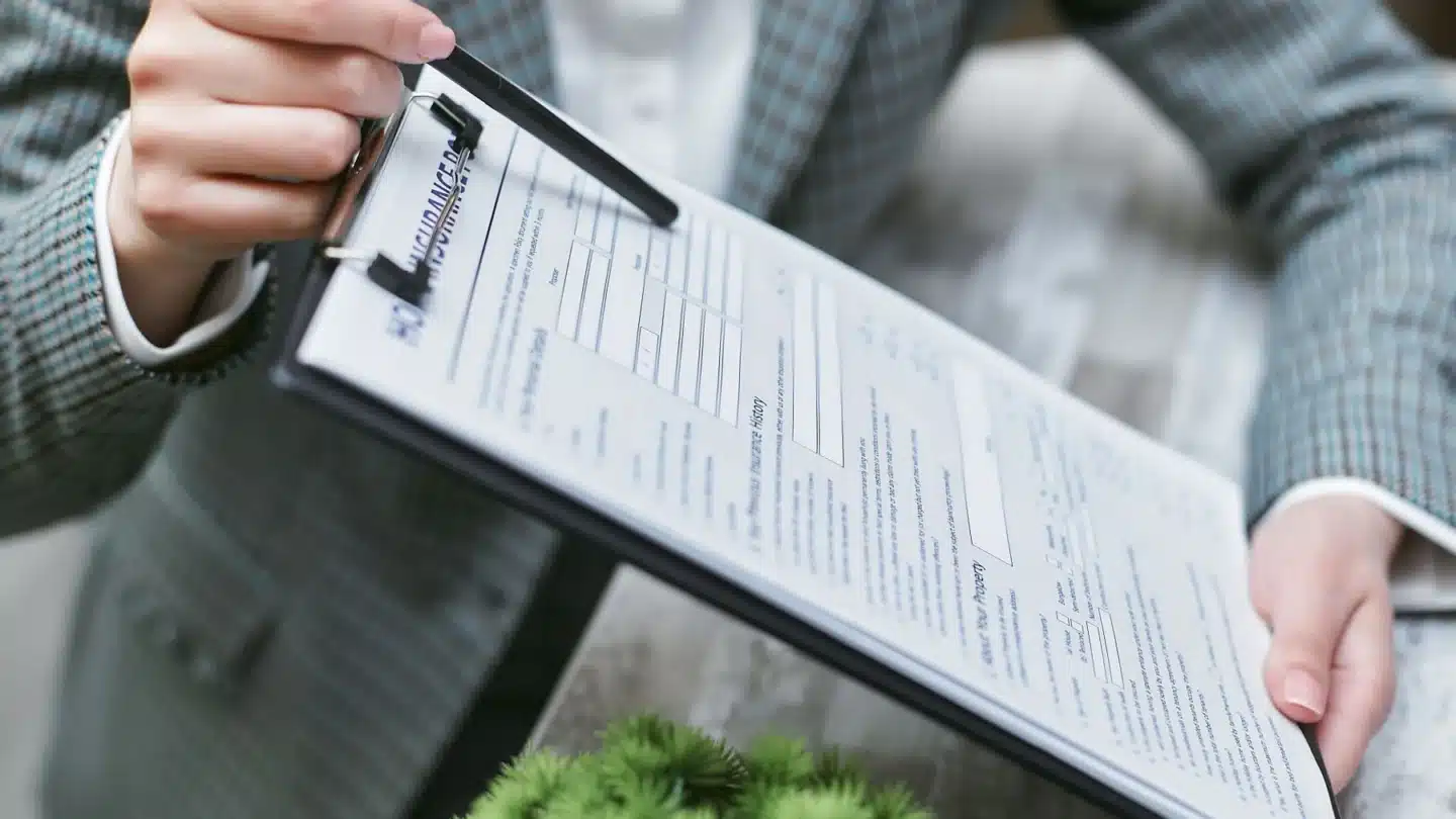 Insurance Marketing Agency: insurance agent presenting a policy document