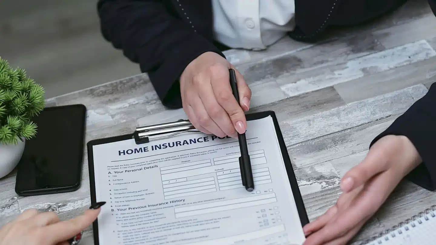 Independent Insurance PPC Agency Hero Independent Insurance PPC Agency: professional presenting policy paperwork