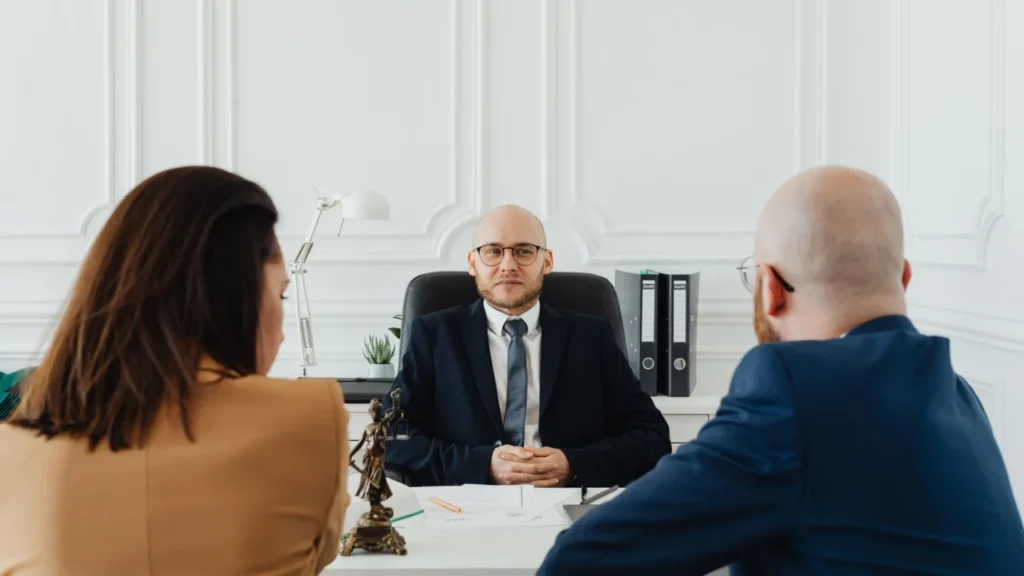 SEO Services for Family Law: couple receiving guidance from a lawyer