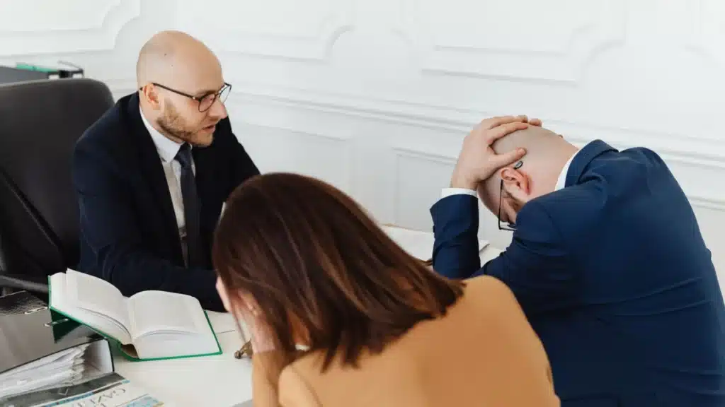 Medical Malpractice Law Lead Generation Agency Photo A Medical Malpractice Law Legal Intake Optimization Company: lawyer advising clients during a serious consultation