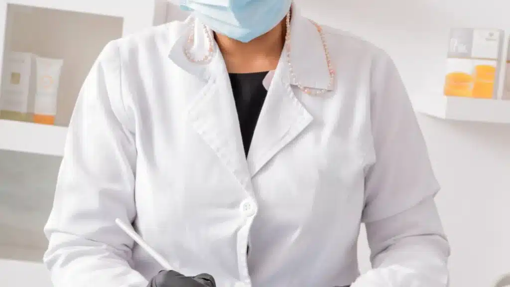 Body Contouring PPC Agency Photo B Body Contouring Paid Search Agency: aesthetic medicine professional applying facial treatment