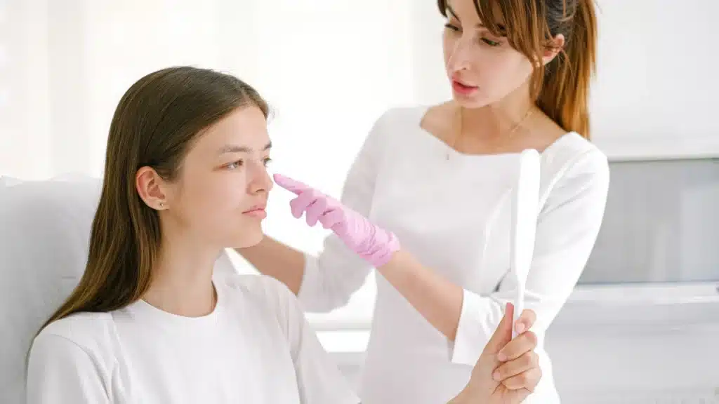 Plastic Surgery and Aesthetic Medicine SEO Agency: patient consulting with a cosmetic medical professional in a clean aesthetic medicine clinic