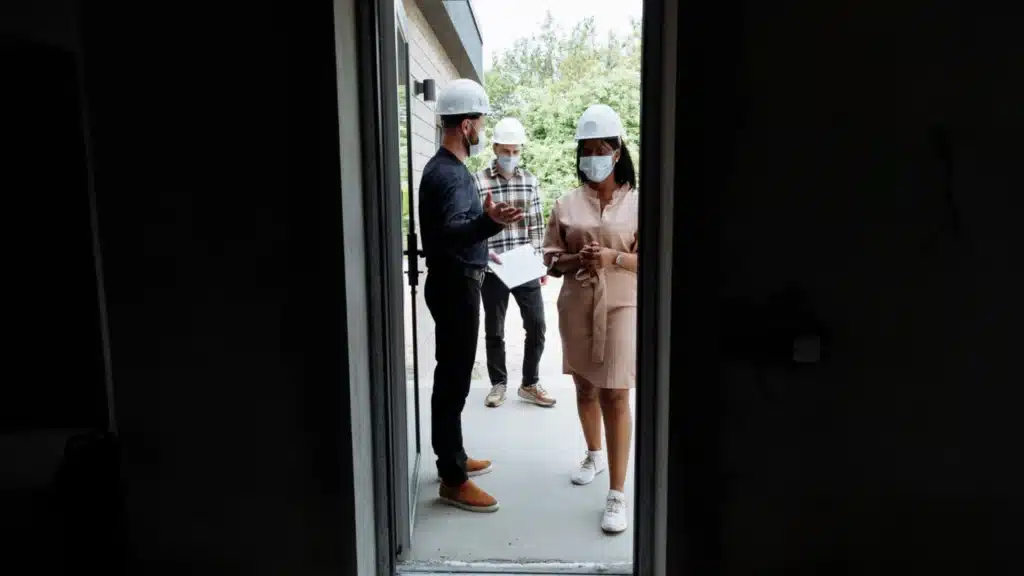 Real Estate and Property Management Digital Marketing Company: property professionals meeting clients at a development site