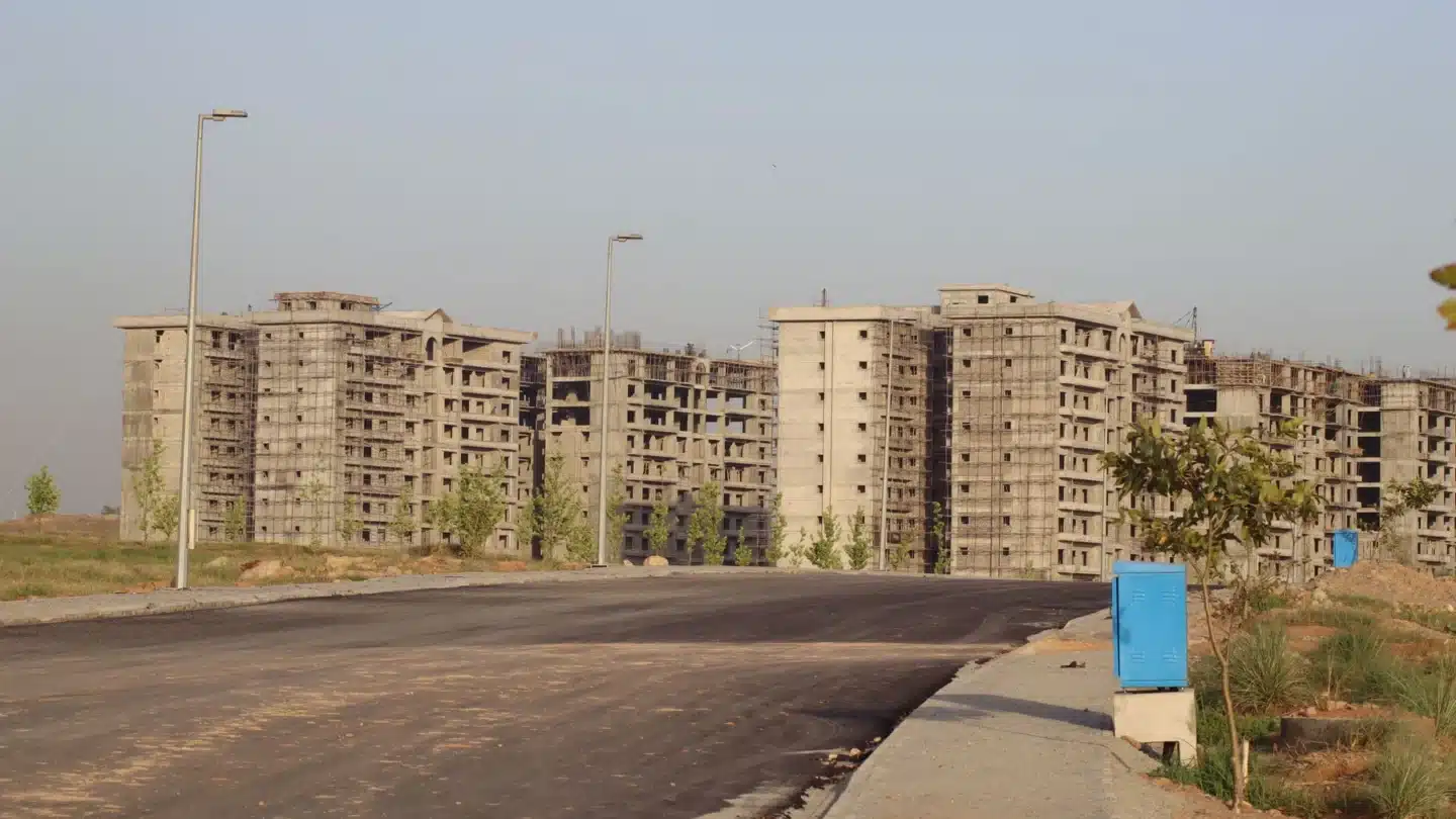 Real Estate Development SEO Agency Hero Real Estate Development SEO Agency: apartment buildings under construction