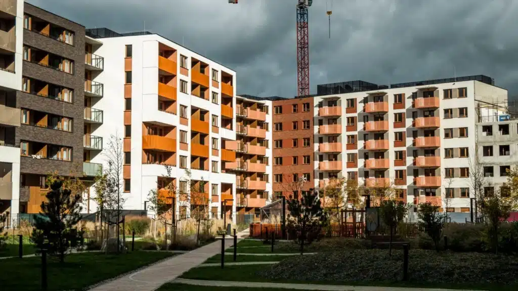 Real Estate Development Marketing Company: residential development with construction crane