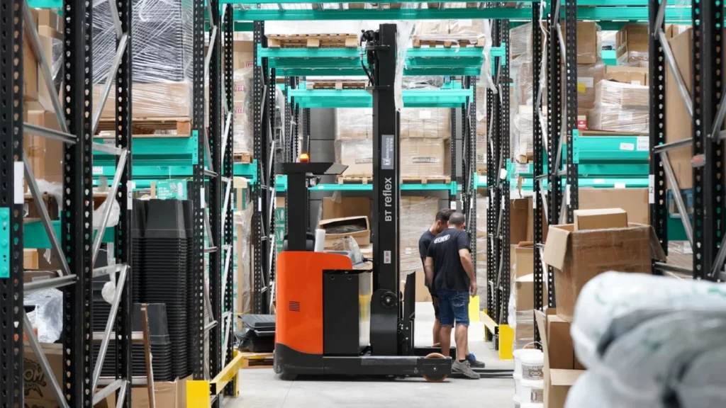 Trucking and Logistics Digital Marketing Company: warehouse employees managing forklift operations