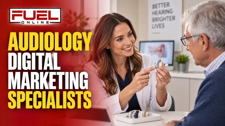 audiologist demonstrating a small hearing aid to an older adult in a modern hearing clinic in Fuel Online’s audiology Digital Marketing, SEO, AEO & GEO specialist banner